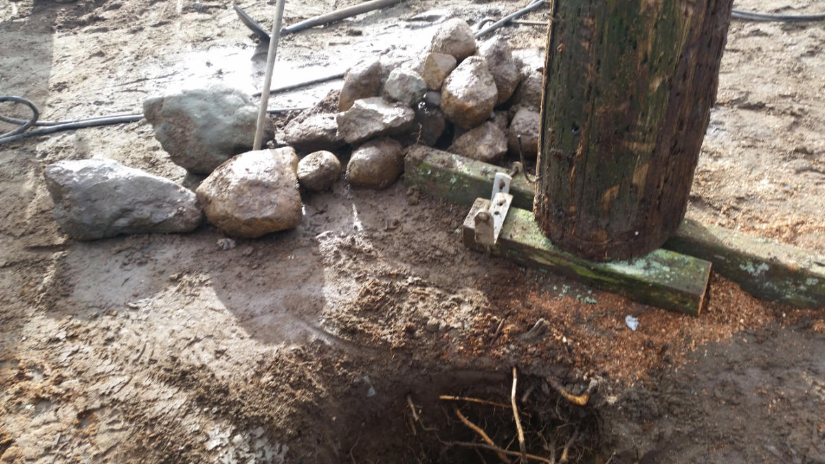 Augered utility pole hole prepared by Metro Power