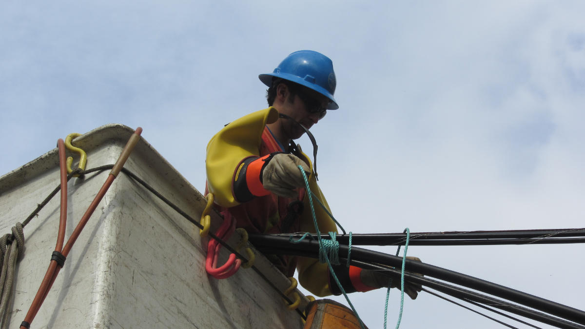Overhead power line installation by Metro Power