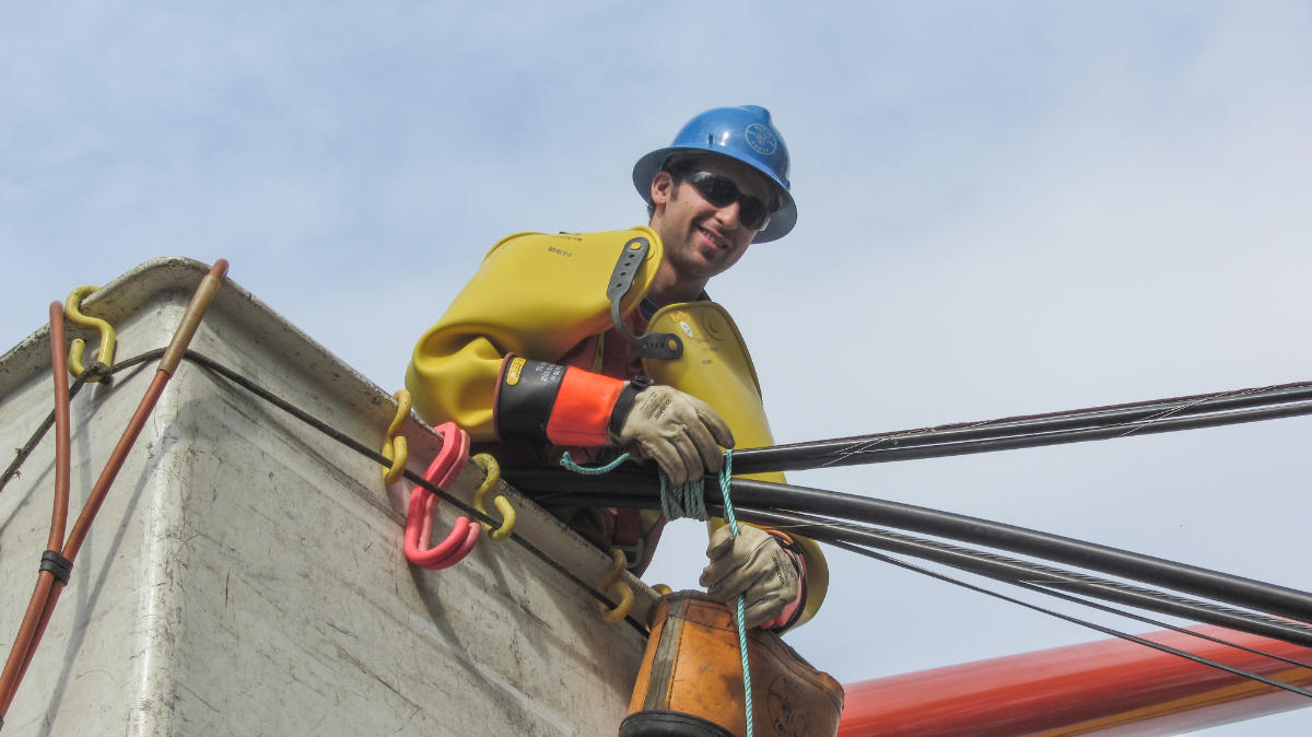 Metro Power technician preparing utility line gear